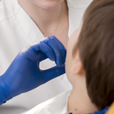 dentist-cleaning-child-s-teeth